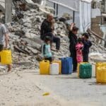 Palestinians,try,to,obtain,clean,drinking,water,due,to,the
