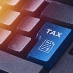 Computer,keyboard,with,tax,button,concept