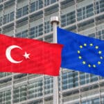 Turkey,and,europe,flags,waving,in,the,wind,(3d,rendered)