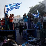 Greek,roma,take,part,in,a,protest,against,a,state