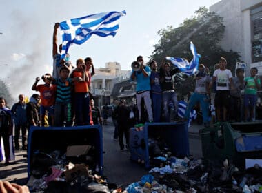 Greek,roma,take,part,in,a,protest,against,a,state