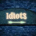 Street,sign,the,direction,way,to,idiots