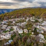 Aerial,view,of,the,traditional,stone,village,koukouli,during,fall