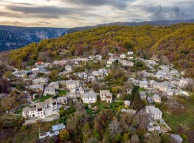 Aerial,view,of,the,traditional,stone,village,koukouli,during,fall