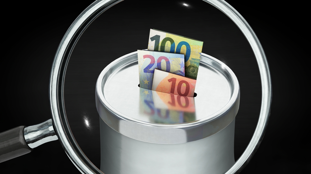 3d,illustration,,magnifying,glass,over,donation,box,with,euro,notes