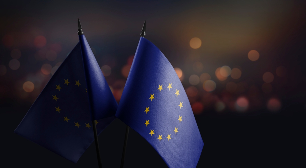 Small,national,flag,of,the,european,union,on,a,black