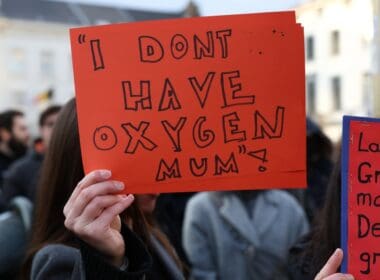 People,demonstrate,demanding,justice,and,accountability,for,the,fatal,train