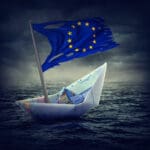 Sinking,euro,ship,with,a,torn,flag ,crisis,concept