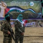 Al qassam,brigades,during,the,handover,of,israeli,prisoners,to,the