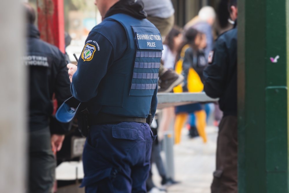 Hellenic,police,with,"greek,police",logo,emblem,on,uniform,,greek