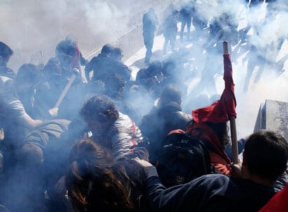 Demonstrators,clash,with,police,as,they,try,to,take,the