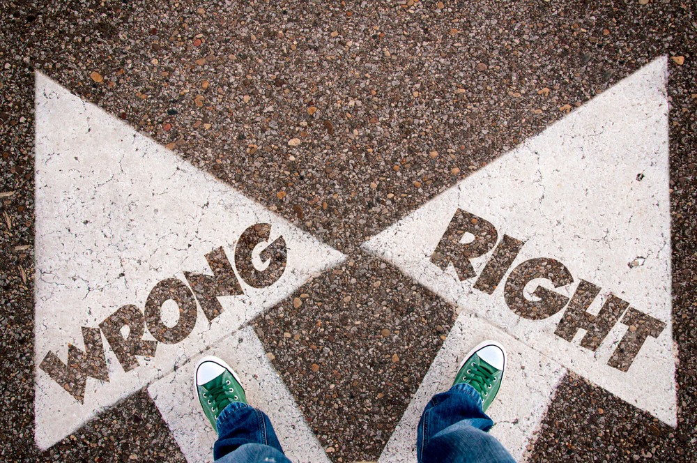 Wrong,and,right,dilemma,concept,with,man,legs,from,above