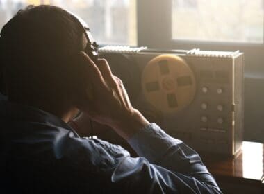 Secret,agent,listens,on,the,reel,tape,recorder ,officer,wiretapping