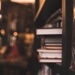 Stack,of,paper,books,in,bookstore,or,library,close,up