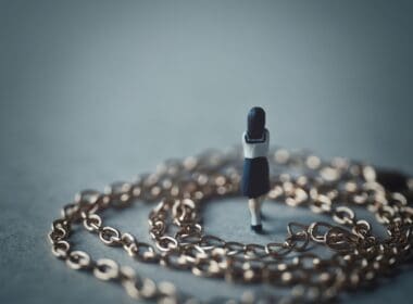 Chain,and,miniature,female,student,back,view