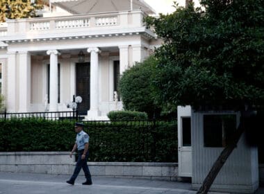 Policeman,stands,outside,of,maximos,mansion,in,athens,,greece,on