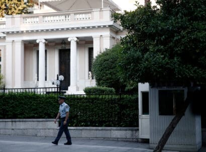 Policeman,stands,outside,of,maximos,mansion,in,athens,,greece,on