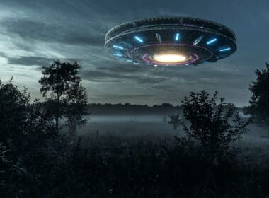 Ufo,,an,alien,plate,hovering,over,the,field,,hovering,motionless