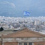 Flag,of,greece,waving,on,top,of,greek,parliament,during