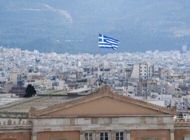 Flag,of,greece,waving,on,top,of,greek,parliament,during