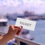 Hand,holding,blank,mockup,for,ticket,or,card,design,,at