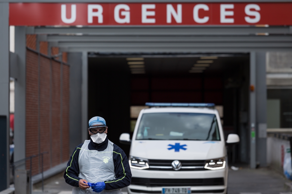 A,paramedic,walks,outside,the,cochin,hospital,in,paris,,france