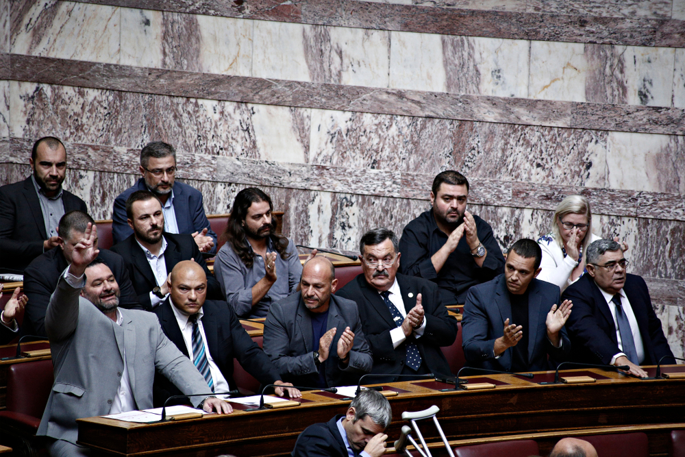 Lawmakers,of,far right,golden,dawn,party,attend,in,a,discussion