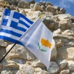 National,flags,of,cyprus,and,greece,in,hand,in,front
