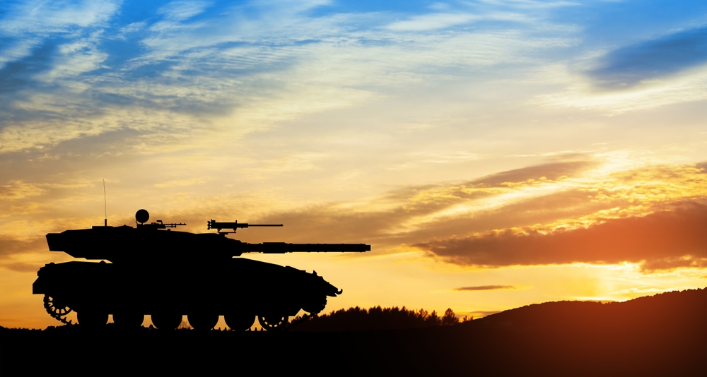 Silhouette,of,army,tank,at,sunset,sky,background ,military,machinery