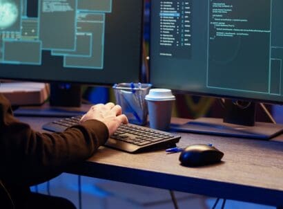 Hacker,hiding,in,underground,bunker,,chatting,with,friend,in,telephone