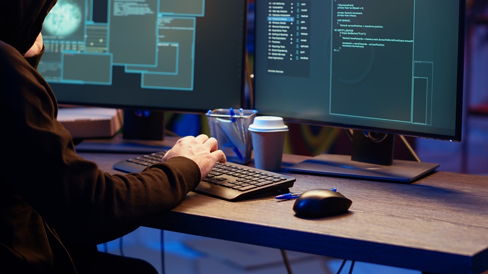 Hacker,hiding,in,underground,bunker,,chatting,with,friend,in,telephone