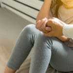 Man,giving,hand,to,depressed,woman,suicide,prevention,mental,health,care,concept,help