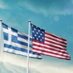 Greece,and,america,friendship,flags,are,waving,in,the,sky two