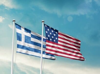 Greece,and,america,friendship,flags,are,waving,in,the,sky two