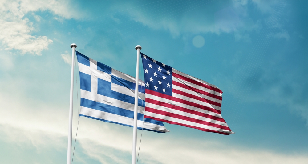 Greece,and,america,friendship,flags,are,waving,in,the,sky two