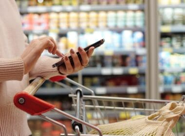 Side,view,close,up,of,woman,shopping,in,supermarket,and